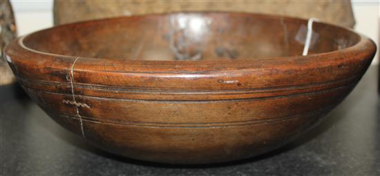 A 19th century turned fruitwood bowl, 14.25in.